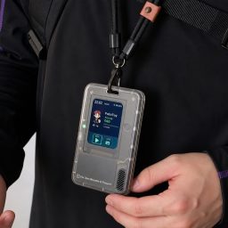 TRAE AI Card worn as a programmable identity badge